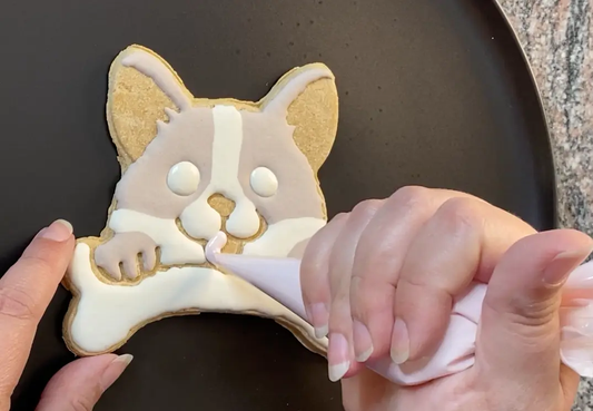 decorating a dog treat